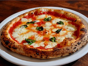 Famoso pizza, a Canadian franchise that started in Edmonton, is mentioned in the new guide to the best pizzas in the world.