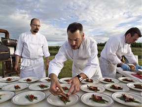 From left to right, chefs Rob Ingram, Blair Lebsack and Corey McGuire prepare a feast at Nature's Green Acres.