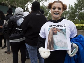 Hannah Kohlman, 14, poses for a photo as she waits in line for Beyonce's The Formation World Tour stop at Commonwealth Stadium, in Edmonton on Friday May 20, 2016.