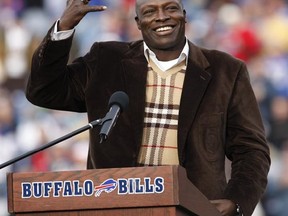 FILE - In this Nov. 29, 2009, file photo, former Buffalo Bills defensive end Bruce Smith smiles during his Hall of Fame ring ceremony at halftime of an NFL football game between the Bills and the Miami Dolphins in Orchard Park, N.Y. The Bills will retire Bruce Smith&#039;s No. 78 at the home opener this fall. The team announced Wednesday, May 11, 2016, that the Hall of Fame defensive end be honored with a jersey retirement ceremony to take place in during halftime of the Bills&#039; prime-time game agains