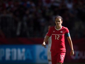 Canada&#039;s Christine Sinclair looks on during first half of the FIFA Women&#039;s World Cup round of 16 soccer action in Vancouver on June 21, 2015. Christine Sinclair leads a squad infused with youth for a pair of women&#039;s soccer friendlies against Brazil as Canada gears up for the Rio Olympics in August. The Canadian captain is one of five players over 30 on the 20-woman squad, which looks to be the template coach John Herdman will work on in choosing his Olympic roster. The others are defenders Rhian