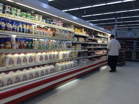 A shopper browses the food section at the Fort McMurray Walmart store on May 31, 2016.