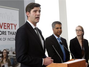 Mayor Don Iveson, with Alberta Human Services Minister Irfan Sabir and Renee Vaugeois, director of the John Humphrey Society of Peace and Human Rights, announced Thursday that the city and the province will be providing low-income Edmontonians with discounted monthly transit passes starting next fall, a move that will cost $12.4 million in total over three years.