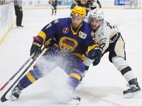 Carleton Place Canadians' Marcus Joseph, left, is followed by Danny Hanlon of the Trenton Golden Hawks during the RBC Cup at the Centennial Civic Centre on Sunday, May 15, 2016, in Lloydminster, Sask. (Tyler Marr)