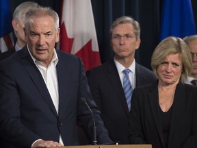 Steve Williams, president and CEO of Suncor speaks to the media Tuesday. Premier Rachel Notley met with oil company executives  to discuss next steps following the wildfire that ravaged Fort McMurray and slowed oil production.