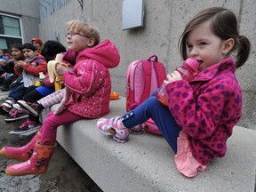 A 2013 file photo shows children from the Malmo Preschool enjoying a snack outside the Muttart Conservatory after a field trip to see Putrella, the corpse flower. Provincially funded Early Learning and Child Care Centres (ELCC) are helping to bridge financial gaps in early child care for parents in the province, says a Public Interest Alberta survey.