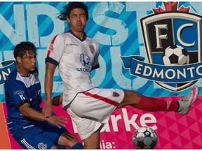 EDMONTON, ALTA: AUGUST 5, 2015 Dustin Corea of FC Edmonton has his shot blocked by an Indy Eleven defender, in Edmonton on August 5, 2015.(Photo by Brady McDonald / Edmonton Journal)