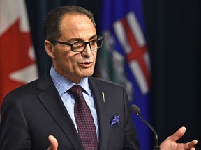 Finance minister Joe Ceci says Alberta's deficit for 2014-15 hit $6.4 billion.