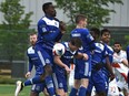 FC Edmonton defend against a free kick after a foul in the last seconds of the match sealing the 1-0 win over the Carolina RailHawks during NASL action at Clarke Field in Edmonton on May 22, 2016.