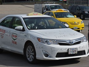 Local taxis drivers offered free rides for the Fort McMurray evacuees at the Northlands Expo Centre that fled the wildfire on May 4.