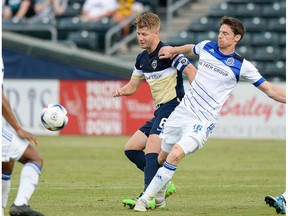 FC Edmonton forward Daryl Fordyce, shown here battling an Armada opponent for the ball, was involved in the play that resulted in the Eddies goal in their 1-0 victory Wednesday in Jacksonville, Fla. (Supplied)