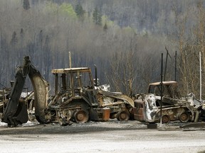 Fort McMurray residents are counting down the days until they can return to their city. This photo, from a May 9 media tour, shows one of the damaged areas, but officials say about 90 per cent of the city was saved.