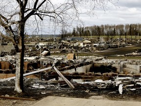 A fire ravaged Beacon Hill neighborhood in Fort McMurray on May 9. Insurance Bureau of Canada executives said Thursday it's too early to estimate the losses.