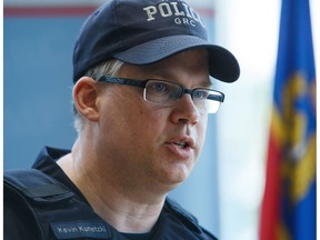 Insp. Kevin Kunetzki speaks to the media Wednesday, May 11, after returning to Edmonton from Fort McMurray.