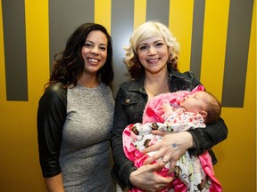 Joy Dawn, left, poses with Tanya Anderson and her five-month-old baby, Bianca, at the 2016 Fashion For Freedom Gala at City Life in Leduc.
