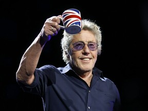 Lead singer Roger Daltrey greets the fans with a cheers on The Who Hits 50! tour at the ACC in  Toronto, on Tuesday March 1, 2016. Jack Boland/Toronto Sun/Postmedia Network