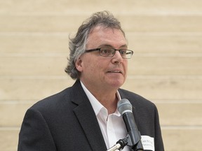 Cam McDonald, executive director, Right at Home Housing Society, takes part in a press conference on future of affordable housing, at City Hall in Edmonton on Tuesday, May 24, 2016.