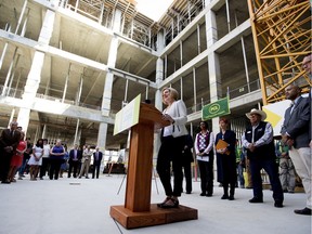 Premier Rachel Notley takes part in a press conference inside the under-construction Singhmar Centre for Learning, at NorQuest College, in Edmonton Alta. on Monday May 2, 2016. The provincial government is restoring $16 million in capital funding to NorQuest College in its 2016 budget. (David Bloom photo)