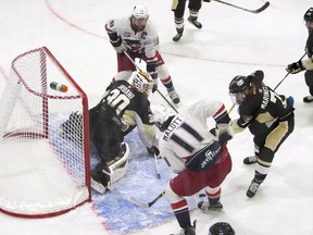 The Trenton Golden Hawks, seen here opening the RBC Cup tournament against the Brooks Bandits on May 14, were ousted by the host Lloydminster Bobcats in a 6-2 loss Saturday. (File)