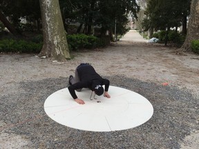 Landscape architect Pierre Belanger demonstrates how to view EXTRACTION. The Canadian "pavilion" at the 2016 Venice Biennale of Architecture isn't so much a pavilion as a peep-hole in the ground, where visitors can watch a 13-minute video through a gold oculus. The Art Gallery of Alberta is the commissioning sponsor for the exhibit, which opens in Venice on May 28.