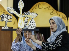 Nimet Kanji (left) and Ntara Curry, in The Book of Ashes, at the International Children's Festival.