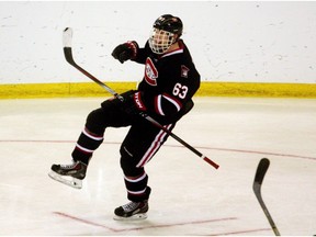 St. Cloud State forward Patrick Russell, left, celebrates his team's tying goal in the final minute of the third period against Michigan Tech during an NCAA college hockey game Friday, March 27, 2015, in Fargo, N.D. The Edmonton Oilers have signed forward Russell to a two-year entry-level contract.