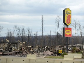 A view of the burned out Super 8 motel is shown during a media tour of the fire-damaged city of Fort McMurray on Monday, May 9, 2016.