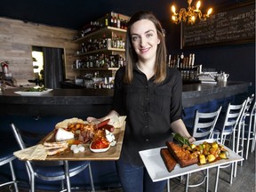 Co-owner Dominique Moquin shows off a charcuterie and cheese board and ratatouille dishes at The Almanac.