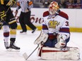 Edmonton Oil Kings goalie Payton Lee makes a save during the second period of a WHL playoff game between the Edmonton Oil Kings and the Brandon Wheat Kings at Rexall Place in Edmonton on April 3, 2016.