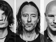 Jonny Greenwood, left, Thom Yorke and Phil Selway, three of Radiohead's five members.