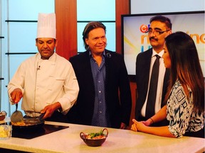 Former deputy premier Thomas Lukaszuk, second from left, Tariq Chaudhry, second from right, and a chef from Maharaja Hall, appear on CTV to promote their Monday night Red Cross fundraiser.