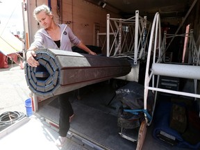 Ambra Zerbini Bauer unloads equipment at The Royal Canadian Circus set up at Northlands Park, in Edmonton on Thursday, June 9, 2016.