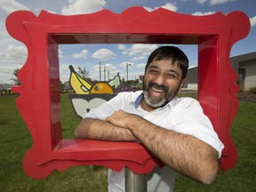 New Edmonton Arts Council executive director Sanjay Shahani poses for a photo inside the public art piece "Still Life" north of Rogers Place, in Edmonton Alta. on June 10, 2016.