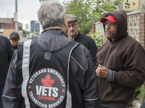 Carl Robichaud speaks with volunteers who came out on Saturday, June 11, 2016, to visit Edmonton homeless shelters in search of homeless war veterans.