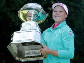 SAMMAMISH, WA - JUNE 12:  Brooke Henderson of Canada poses with the trophy after winning the KPMG Women's PGA Championship at Sahalee Country Club on June 12, 2016 in Sammamish, Washington.  (Photo by Jeff Gross/Getty Images) ORG XMIT: 597191263