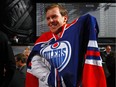 Tyler Benson reacts after being selected 32nd overall by the Edmonton Oilers during the 2016 NHL Draft on June 25, 2016 in Buffalo, New York.