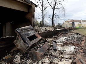 Insurance company claims centres in Fort McMurray started dealing Wednesday with residents whose homes might be destroyed, full of smoke or containing refrigerators full of rotting food.