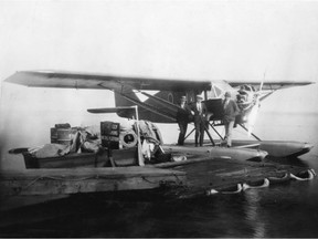 Aviator Wop May (on left) with two other people at Cooking Lake seaplane base in the late 1920s beside the Bellanca "Pacemaker".