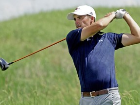 Brett Hogan (Glencoe Golf & Country Club) hits a ball at the 2016 Alberta Open golf tournament held at RedTail Landing Golf Club in Nisku on June 22, 2016.