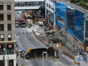 A large portion of Rideau Street in downtown Ottawa caved in, causing a massive sinkhole that knocked out power to the majority of the downtown area on June 8, 2016.