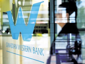 The Canadian Western Bank reported a drop in first-quarter profits Thursday due mainly to higher provisions for loan losses.