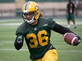 Aaron Grymes during Edmonton Eskimos practice at Commonwealth Stadium in Edmonton on August 26, 2015. Jutras is travelling across Canada to photograph CFL players and fans for a photo book.
