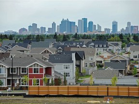 Housing prices in Edmonton, pictured in a file photo, and Calgary are putting the squeeze on middle-income Albertans, as prices in the last 15 years have increased at far faster than the rate of income growth. That's something governments need to worry about, writes Wendell Cox.