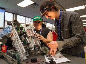 Edmonton Catholic Schools assistant superintendent Tim Cusack writes about the many ways the district supports enriched learning in Wednesday's letters to the editor. In this 2015 file photo two Archbishop Jordan Catholic High School make some adjustments to their VEX robot during the Edmonton Regional VEX competition at NAIT.
