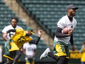 Slotback Adarius Bowman runs a drill during an Edmonton Eskimos walkthrough at The Brick Field at Commonwealth Stadium on June 17, 2016. The CFL team plays a pre-season home game on Saturday versus the Saskatchewan Roughriders.