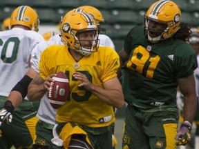 Edmonton Eskimos quarterback Mike Reilly scrambles from the pocket to make a pass during practice at Commonwealth Stadium in Edmonton Alta. on Wednesday June 8, 2016.