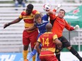 FC Edmonton forward Jake Keegan fights off a group of Fort Lauderdale Strikers defenders to head the ball home for his second goal in the Eddies 2-1 victory Sunday, June 12, 2016 at Clarke Park in Edmonton, Alta. (Uwe Welz)
