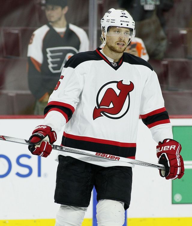 FILE - In this Sept. 30, 2015, file photo, New Jersey Devils' Adam Larsson is shown during a preseason NHL hockey game against the Philadelphia Flyers in Philadelphia. The New Jersey Devils have acquired former No. 1 overall draft pick Taylor Hall from the Edmonton Oilers for defenseman Adam Larsson. The teams announced the trade Wednesday, June 29, 2016, two days before the start of free agency.