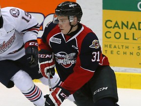 Windsor Spitfires defenceman Mikhail Sergachev in OHL action on Jan. 14, 2016.