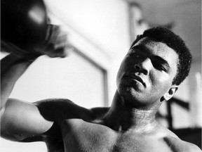 Muhammad Ali trains with a speedbag in this undated file photo.  Ali died Friday, June 3, 2016 at the age of 74.